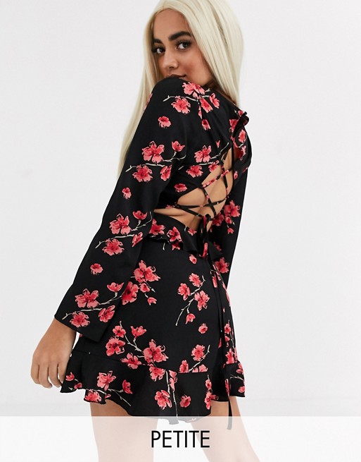 PrettyLittleThing Petite tea dress with open lace up back in black floral print