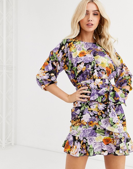 PrettyLittleThing shift dress with ruffle hem and belted waist in purple floral