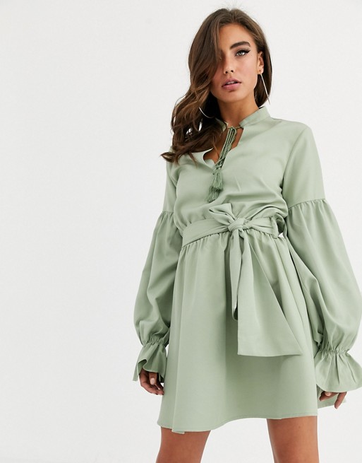 PrettyLittleThing skater dress with tie neck and waist in pale green
