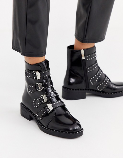 PrettyLittleThing studded boots with buckle detail in black