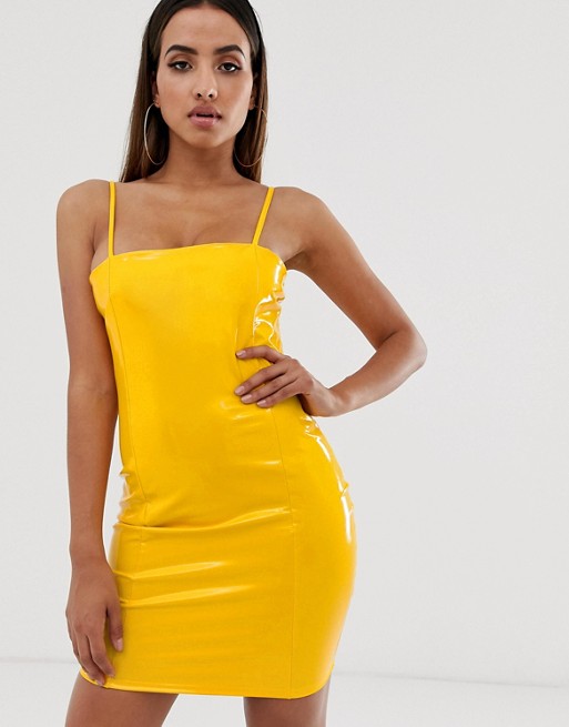 Image 1 of PrettyLittleThing vinyl mini dress in yellow.