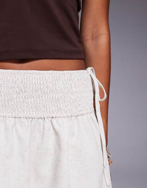 Princess Polly Arroyo linen blend shirred waist tie detail mini skirt in beige, 3 of 5