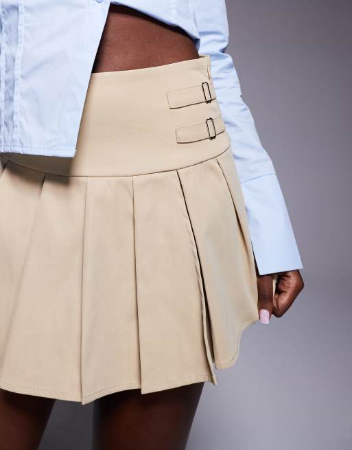 Princess Polly – Cartwright – Kurzer Faltenrock in Beige mit Schnallendetails, 3 von 5