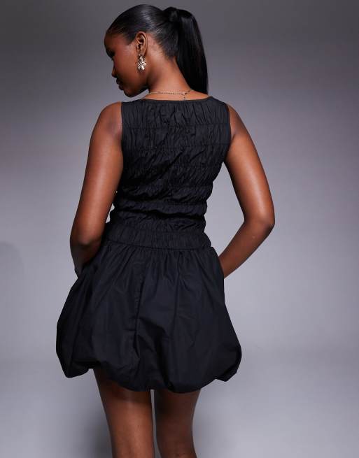 Princess Polly – Demure – Gesmoktes Minikleid in Schwarz mit Ballonsaum, 4 von 4