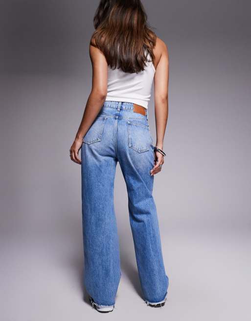 Princess Polly Henesey raw hem high waisted wide leg jeans in mid blue wash