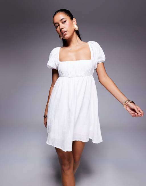 Princess Polly Let's Dance cheesecloth puff sleeve open tie back mini smock  dress in white | ASOS