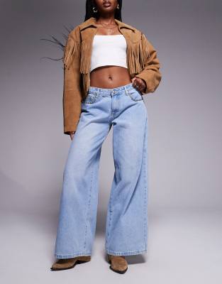 low rise stud detailing baggy wide leg jeans in light blue wash