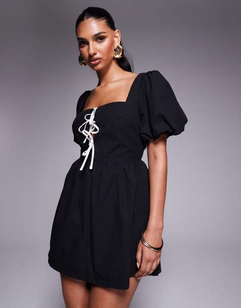 Princess Polly – Maelle – Svart och vit playsuit i bomullsmix med bar rygg, puffärmar och kontrastfärgad knytning framtill - view 1