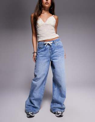 Princess Polly Mellowed Out slouchy ribbon tie wide leg jeans in mid blue wash