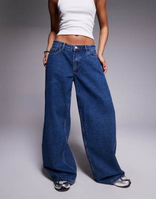 Princess Polly - Ramos - Jeans in Dunkelblau mit niedrigem Bund und weitem Bein