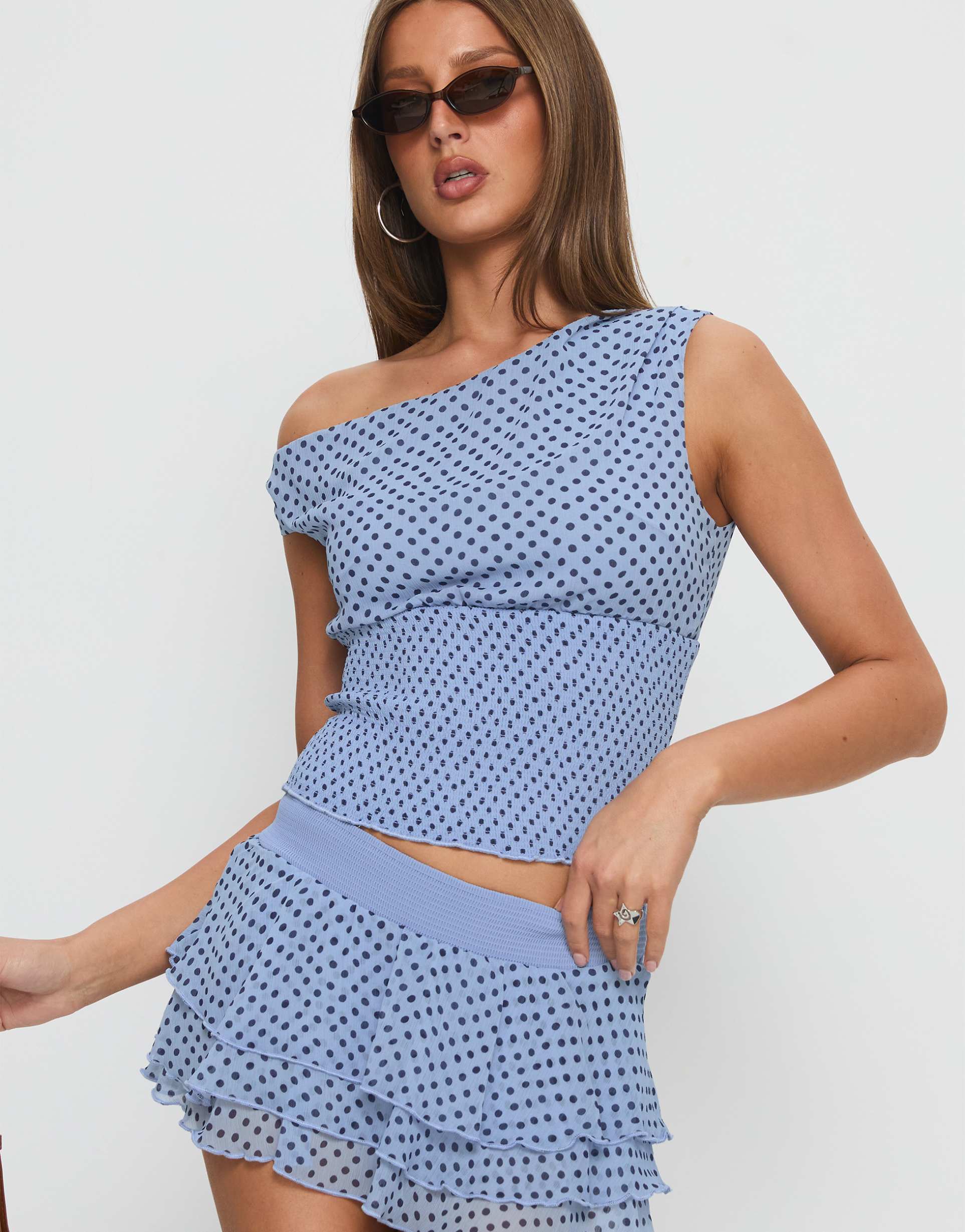 princess polly ready to party asymmetric shoulder shirred waist top in blue polka dot - part of a set
