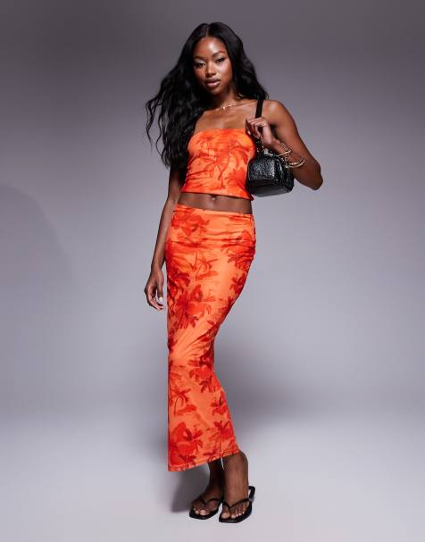 Princess Polly – Set aus Mesh in Orange mit Palmenprint bestehend aus trägerlosem Oberteil und Midirock mit niedrigem Bund - view 1