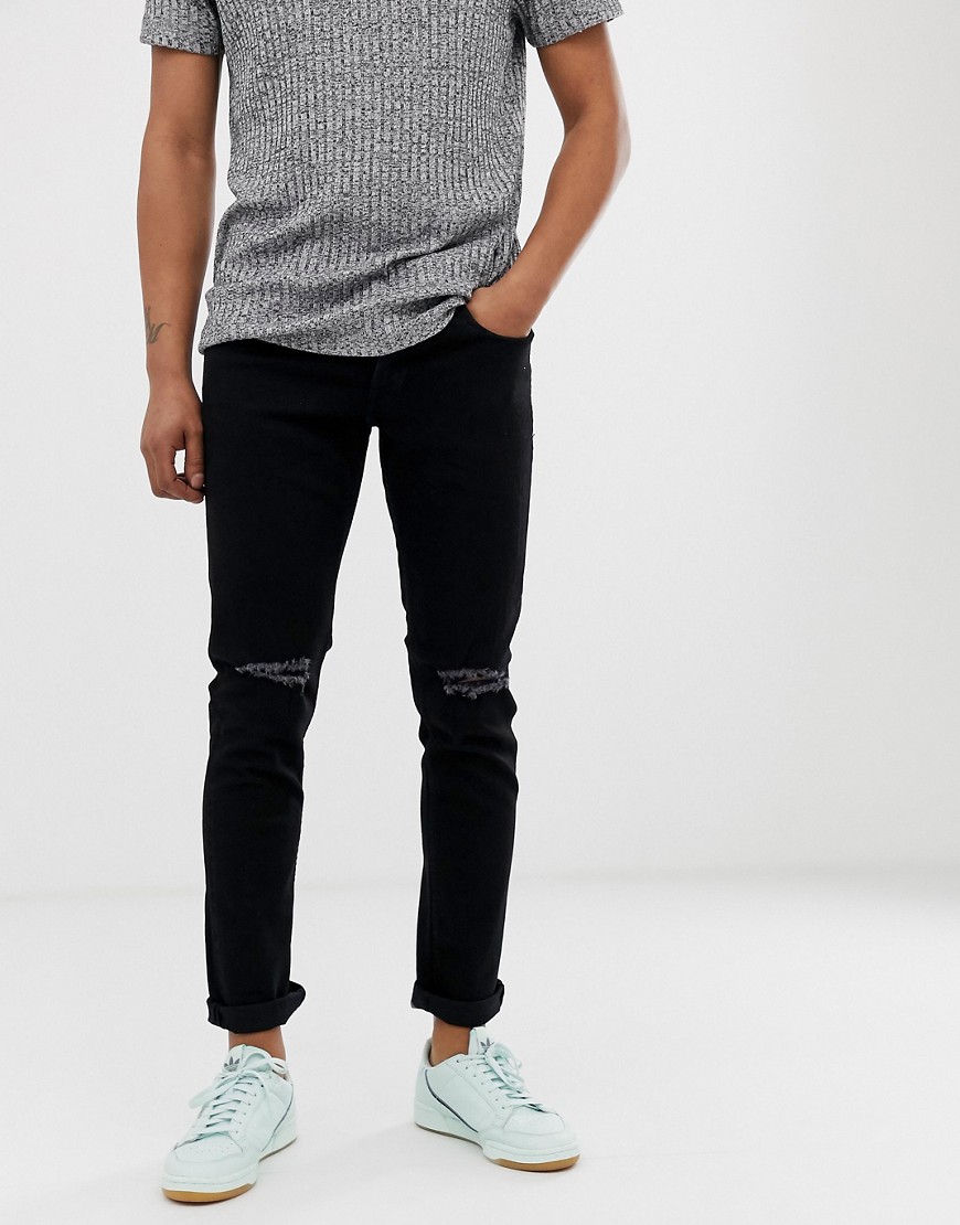 Produkt - Jeans skinny neri con strappi sulle ginocchia-Nero