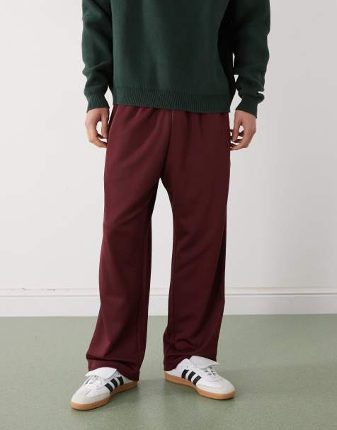 Prohibited loose fit drawstring joggers with constrast stripes in burgundy