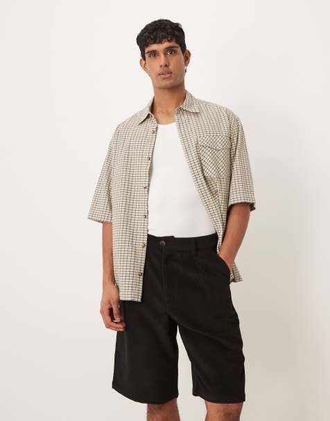 Prohibited double pleated shorts in black 
