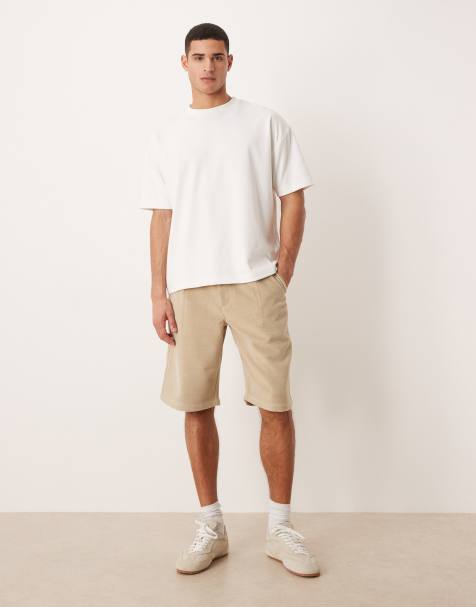 Prohibited double pleated shorts in cream - view 1