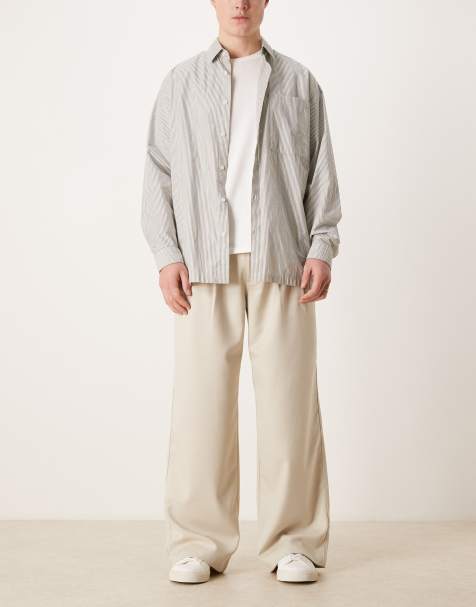 Prohibited double pleated trousers in cream - view 1