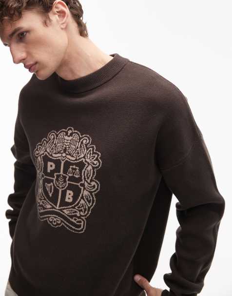 Prohibited knitted emblem logo jumper in brown