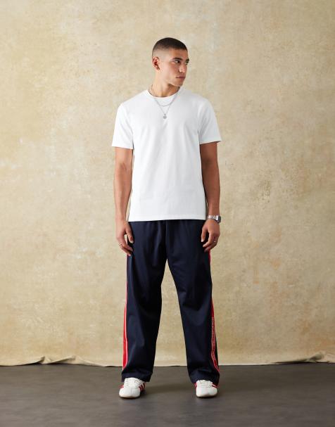 Prohibited logo trackpants in navy - view 1