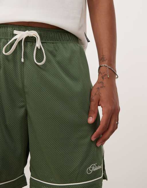 Prohibited mesh shorts in green