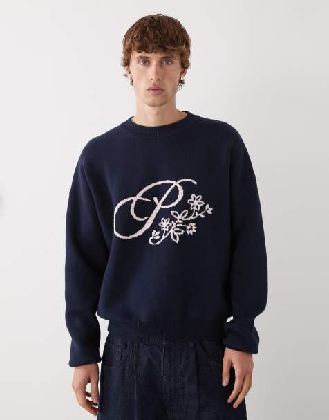 Prohibited – Oversize-Strickpullover in Marineblau mit Blüten-Logo - view 1
