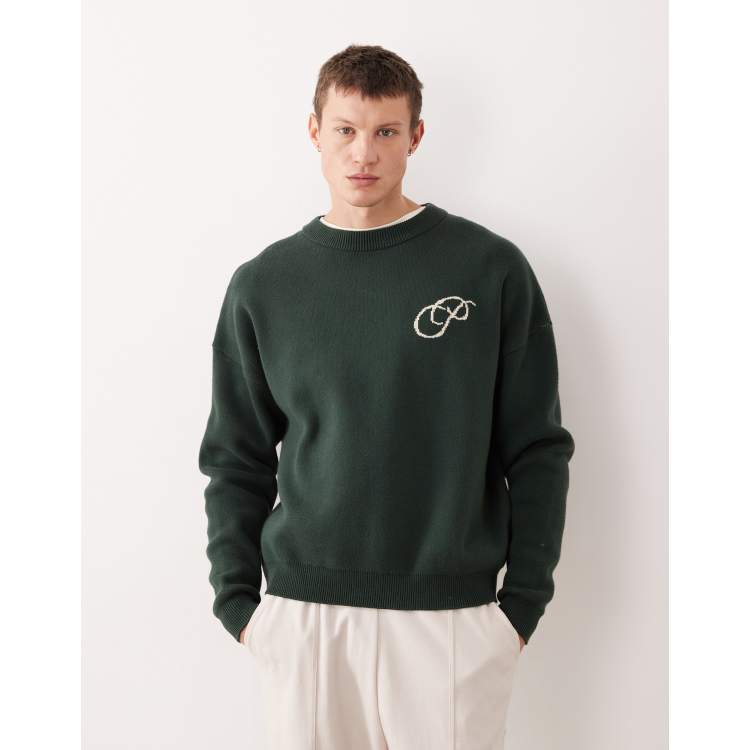 Prohibited oversized boxy fit logo knit sweater in green | ASOS