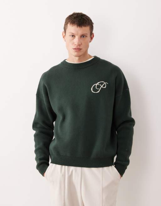 Prohibited oversized boxy fit logo knit sweater in green