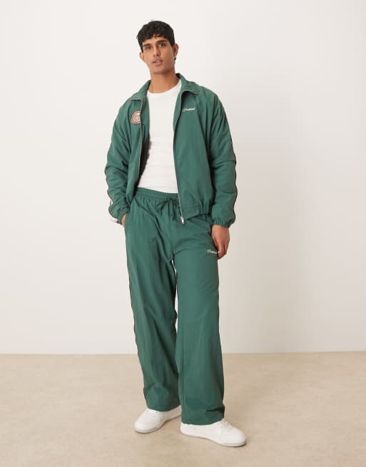 Prohibited slipstream trackpants co-ord in green, 2 of 5