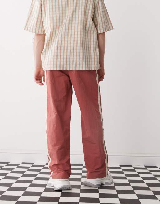 Prohibited stripe track pants in red