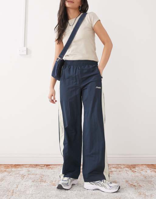 Prohibited stripe trackpants in navy