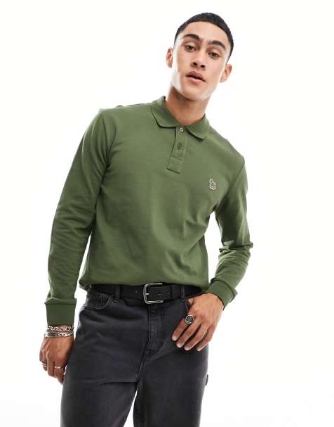 Stussy Heavy Pique Long Sleeve Polo Shirt With Logo Collar, $84, Asos