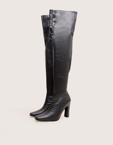 Public Desire Acquaria pu over the knee flared heel boots in black - view 1