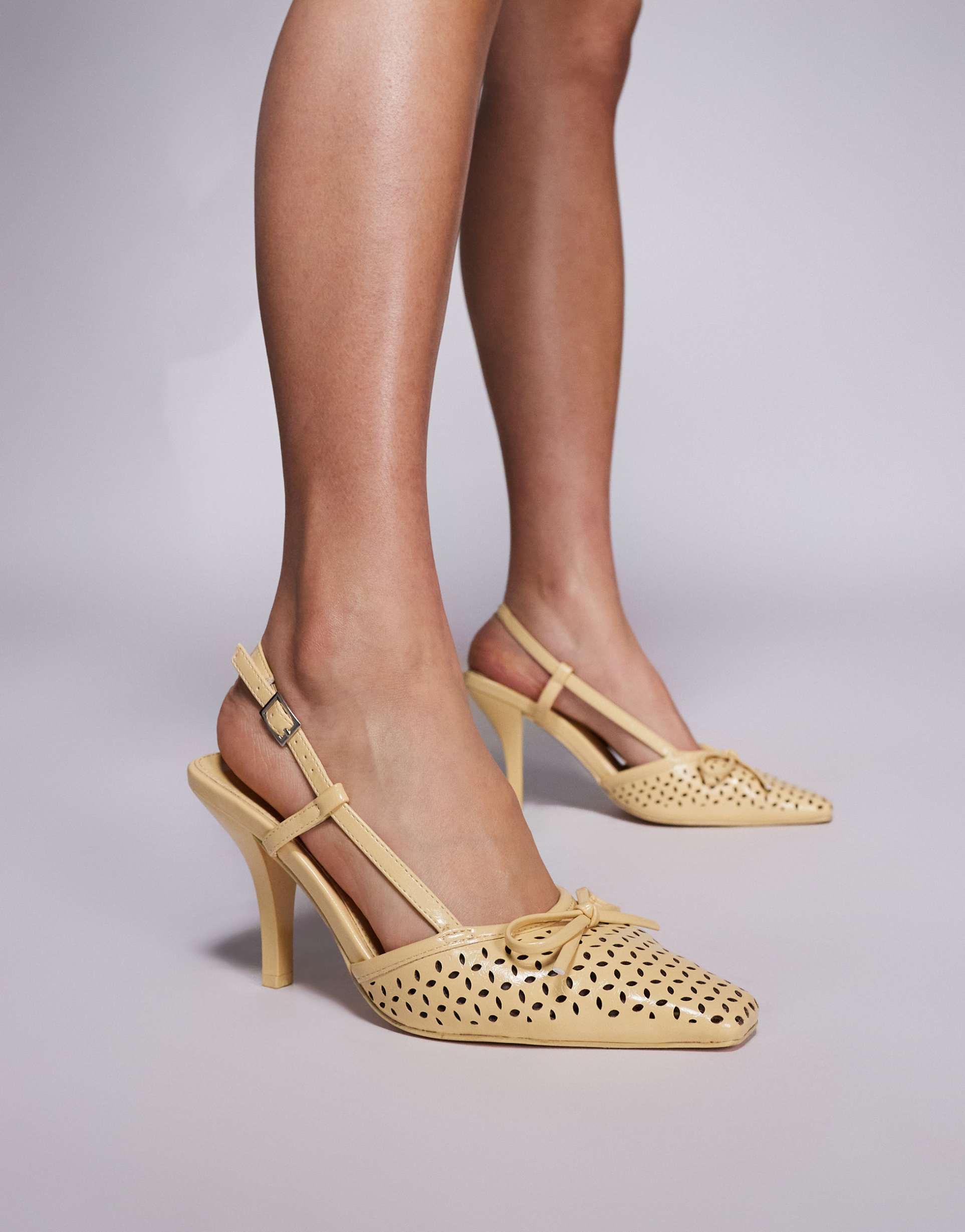 public desire alchemy laser cute sling back heels with bow in yellow