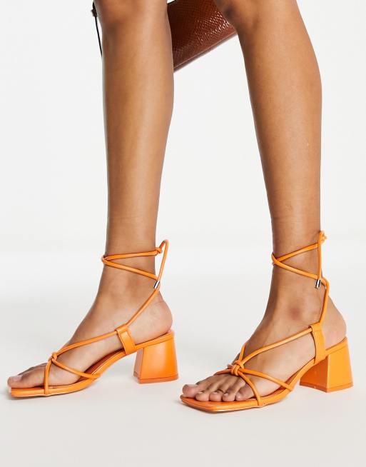 Public Desire Aloha knot strap mid heel sandals in orange ASOS