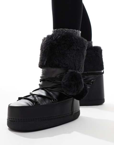 Public Desire Aster snowboots with with fur trim and pom pom detail in Black - view 1