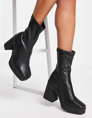 Public Desire Be mine high heeled sock boots in black stretch pu