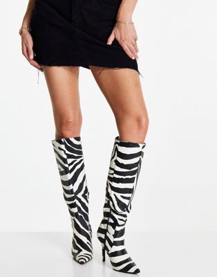 Public Desire Best Believe knee high heel boots in zebra