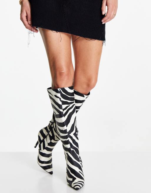 Public Desire Best Believe knee high heel boots in zebra