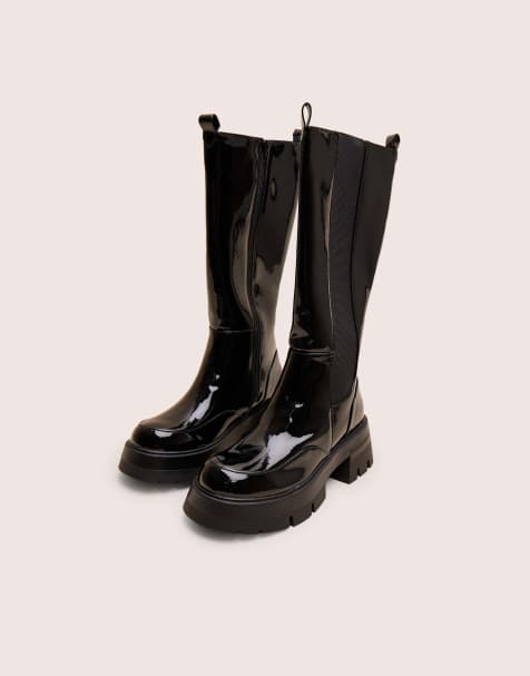 Public Desire Bryant patent chunky sole elasticated knee high boots in black - view 1