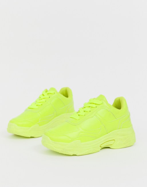 Public Desire Dash neon yellow colour drenched trainers | ASOS