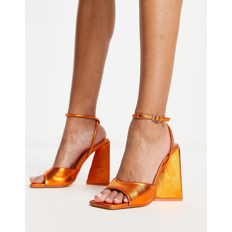 Public Desire Eagle triangle heel sandals in metallic orange