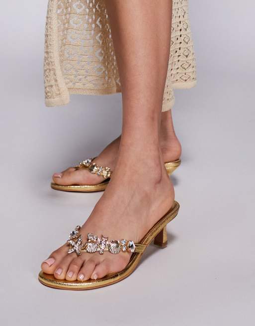 Public Desire - Elowen - Sandali infradito con tacchetti a spillo color oro con stelle marine decorative 
