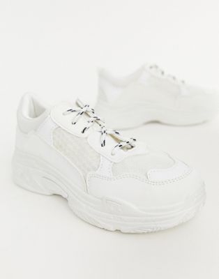 white bulky tennis shoes