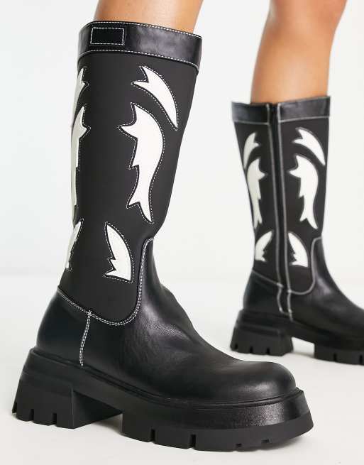 Fly knee outlet boots