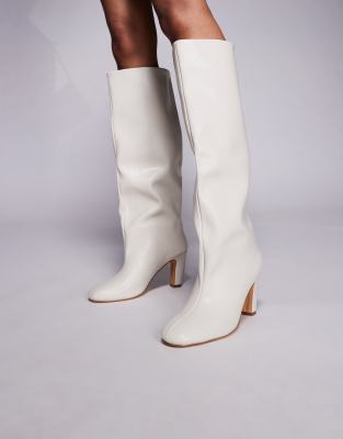  heeled round toe knee boots in off white PU