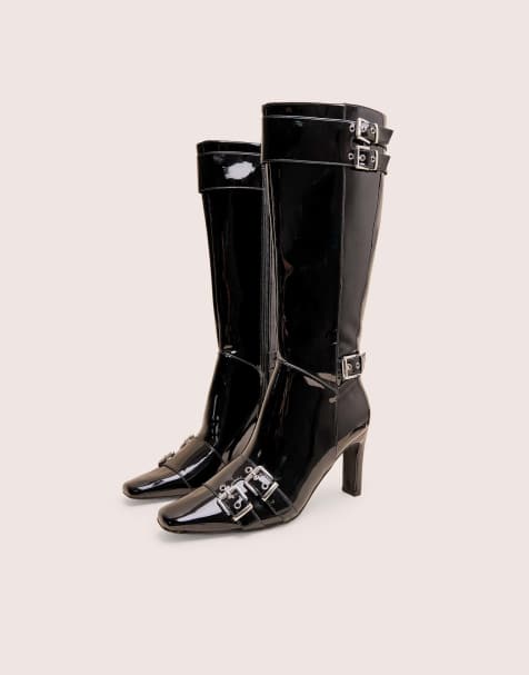 Public Desire Ines patent buckle detail knee high heeled boots in black - view 1
