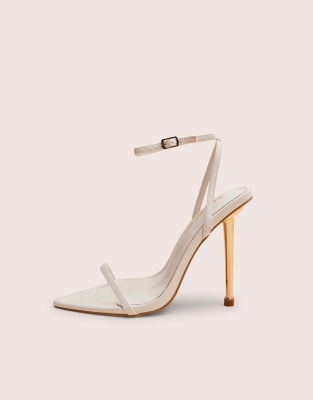 Legacy barely there pointed toe gold stiletto heels 