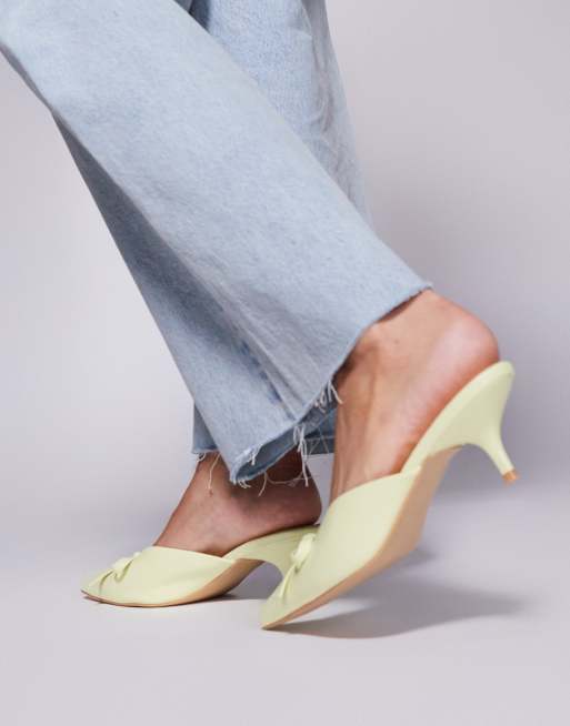Public Desire Lionheart pointed kitten heel mules with bow in yellow, 2 of 4