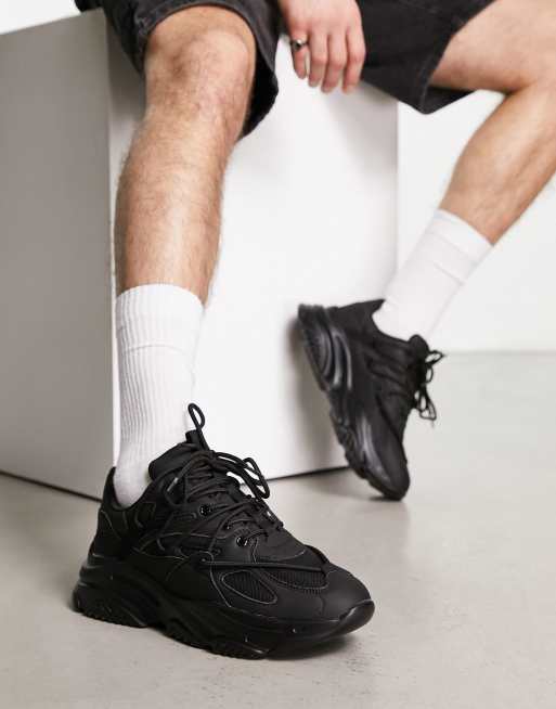 Public Desire – Man Dami – Svarta sneakers med spetsdetaljer