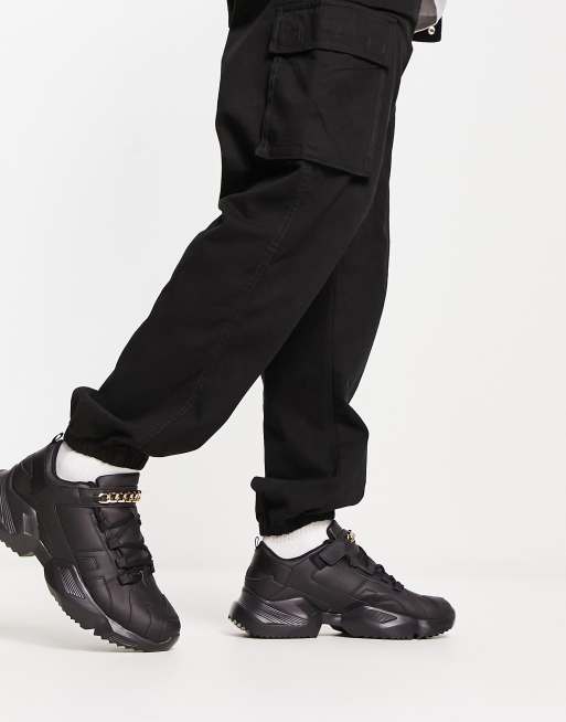 Public desire nobel chain sneakers in black 